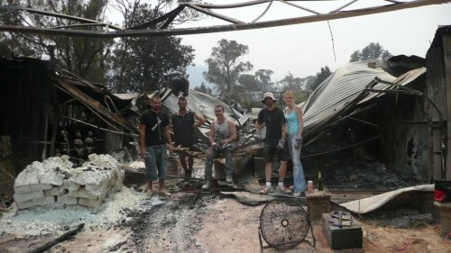 Bushfire aftermath – the daunting task of clearing the ruins of Kevin & Robyn's garden ornament factory.