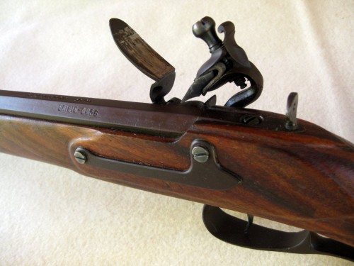 Showing original barrel, hand made side plate and simple rear sight.