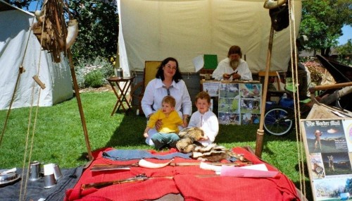 Lisa with Nicholas and Nathaniel at the Club’s display at MMFAT while at the right rear Bob examines a butcher’s knife.