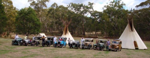 Austin 7 drivers line up with their beautifully restored cars on the Painted Pony Plains, Caveat.