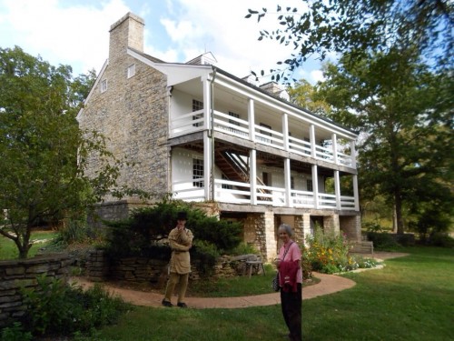 Kay Mohr with guide (in Rifleman’s frock) at Nathan Boone home. 2013 Photo by George.
