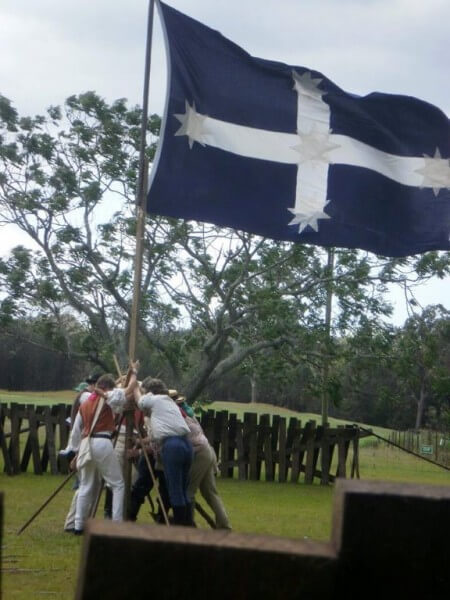 Raising the Southern Cross flag at the Eureka Stockade rebellion re-enactment.